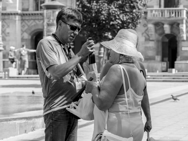 Street Photography - Face to Face - About the wine.
